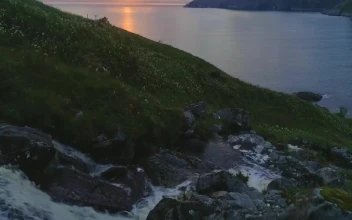Stock Video Hill Tour Near Coast On A Cloudy Day Animated Wallpaper