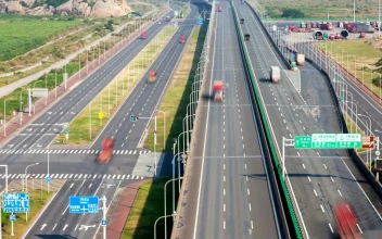 Stock Video Highway With Cars And Trucks During A Sunny Day Animated Wallpaper