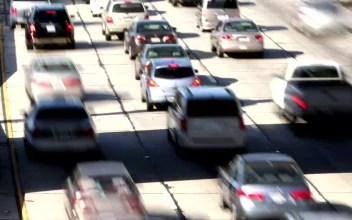 Stock Video High View Of Traffic From A Four Lane Highway Animated Wallpaper