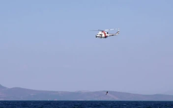 Stock Video Helicopter Rescuing Diver From The Sea Animated Wallpaper