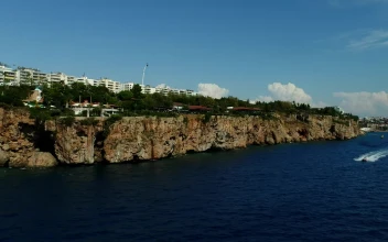 Stock Video Helicopter Racing A Boat Along The Coast Animated Wallpaper