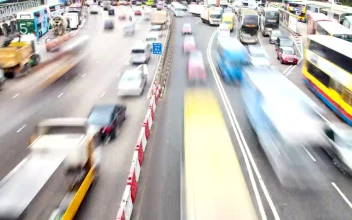 Stock Video Heavy Traffic On A Busy Avenue In Hong Kong Animated Wallpaper
