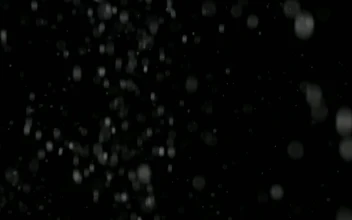 Stock Video Heavy Snow Falling On A Dark Background Animated Wallpaper
