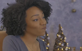 Stock Video Happy Young Woman During A Christmas Dinner Animated Wallpaper