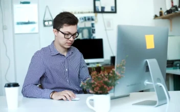 Stock Video Happy Young Businessman Working From Home Animated Wallpaper