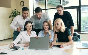 Stock Video Happy Workgroup For Successfully Closing A Deal Animated Wallpaper
