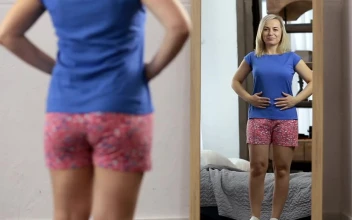 Stock Video Happy Woman While She Looks In The Mirror Animated Wallpaper