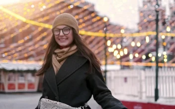Stock Video Happy Woman Stands On The City Downtown At Christmas Animated Wallpaper