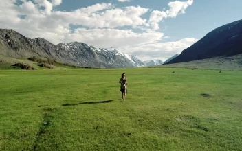 Stock Video Happy Woman Running On The Meadow Animated Wallpaper