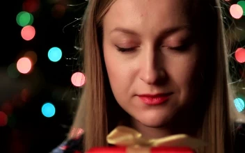Stock Video Happy Woman Holding A Gift Animated Wallpaper