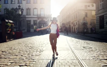 Stock Video Happy Woman Enjoying A Walk In The City Animated Wallpaper
