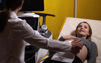 Stock Video Happy Pregnant Woman Having An Ultrasound Animated Wallpaper
