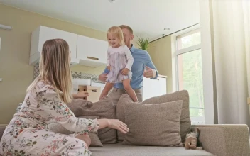 Stock Video Happy Parents Playing With Their Daughter Animated Wallpaper