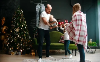 Stock Video Happy Parents Play With Their Daughters At Christmas Animated Wallpaper