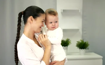 Stock Video Happy Mother Holding Her Little Baby In Arms Animated Wallpaper