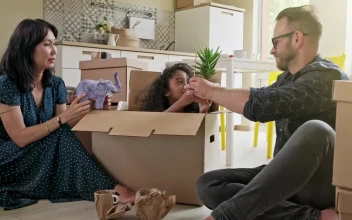 Stock Video Happy Mixed Ethnicity Family Unpacking Boxes Animated Wallpaper