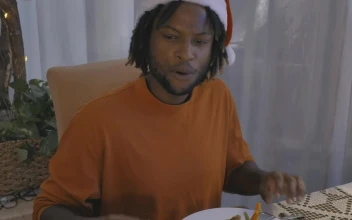 Stock Video Happy Man During Christmas Dinner Animated Wallpaper