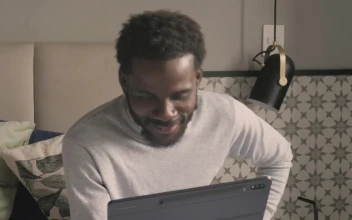 Stock Video Happy Man Chatting By Video Call On A Tablet Animated Wallpaper