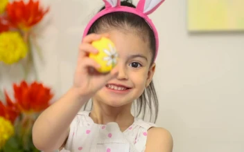 Stock Video Happy Little Girl Showing An Easter Egg Animated Wallpaper