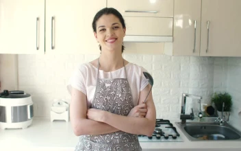 Stock Video Happy Housewife In The Kitchen Animated Wallpaper