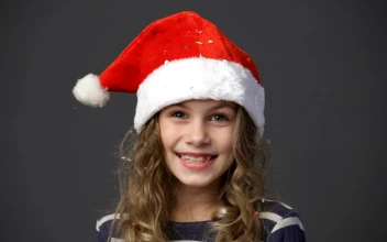 Stock Video Happy Girl Wearing A Christmas Hat Animated Wallpaper