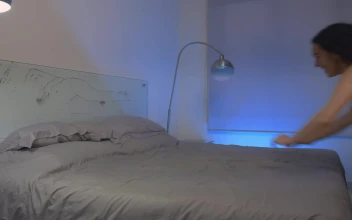 Stock Video Happy Girl Throws Herself On A Bed Animated Wallpaper