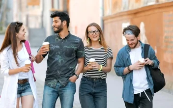 Stock Video Happy Friends Walk Down The Street While Talking Animated Wallpaper