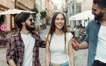 Stock Video Happy Friends Laugh And Walk Down Street Animated Wallpaper