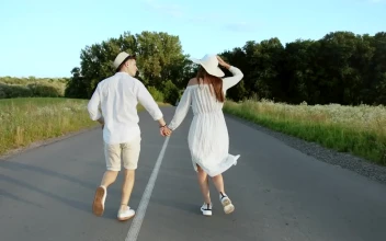 Stock Video Happy Couple Running Down A Road Animated Wallpaper