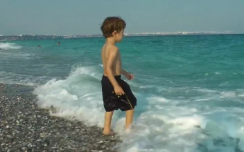 Stock Video Happy Child Playing With The Sea Waves Animated Wallpaper