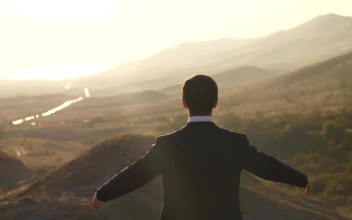 Stock Video Happy Businessman Raises Hands Seen From Behind Animated Wallpaper