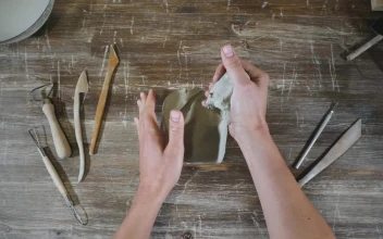 Stock Video Hans Molding Clay In The Workshop Table Animated Wallpaper