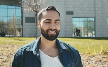 Stock Video Handsome Arab Man Smiles At Camera Outside Building Animated Wallpaper