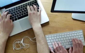 Stock Video Hands Working On Different Keyboards On A Desk Animated Wallpaper