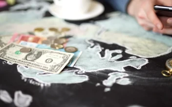Stock Video Hands Using Mobile On Map With Money And Compass Animated Wallpaper