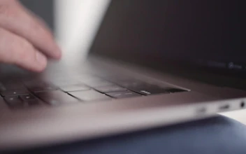 Stock Video Hands Typing Slowly On Laptop Animated Wallpaper