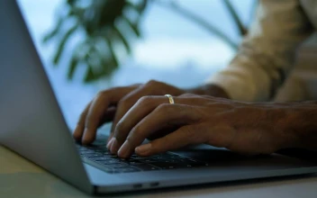 Stock Video Hands Typing Away On A Laptop Animated Wallpaper