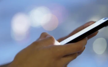 Stock Video Hands Texting On A Mobile Phone At Night Animated Wallpaper