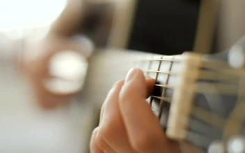Stock Video Hands Playing An Acoustic Guitar Animated Wallpaper
