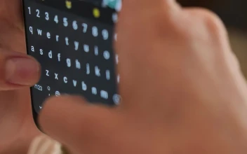 Stock Video Hands Of A Young Woman Typing On Her Smartphone Animated Wallpaper
