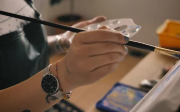 Stock Video Hands Of A Young Woman Painting On A Canvas Animated Wallpaper
