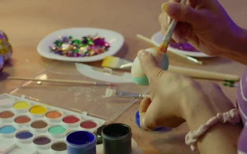 Stock Video Hands Of A Woman Painting Easter Eggs Animated Wallpaper
