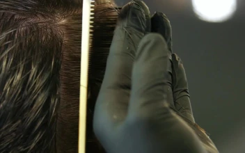 Stock Video Hands Of A Stylist Taking A Lock Of Hair Animated Wallpaper