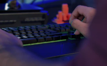 Stock Video Hands Of A Programmer Typing On A Keyboard Animated Wallpaper