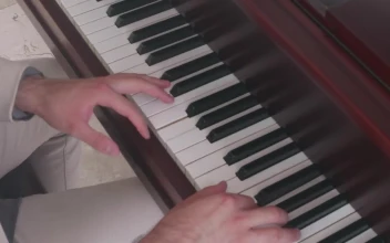 Stock Video Hands Of A Pianist Performing A Song On A Piano Animated Wallpaper