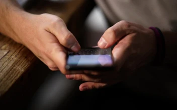 Stock Video Hands Of A Person Typing On A Cell Phone Animated Wallpaper