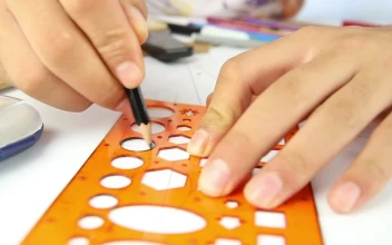 Stock Video Hands Of A Person Drawing Circles With A Template Animated Wallpaper