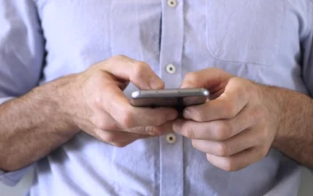 Stock Video Hands Of A Man Using A Smartphone Animated Wallpaper
