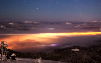 Stock Video Landscape With Illuminated Clouds At Night Animated Wallpaper