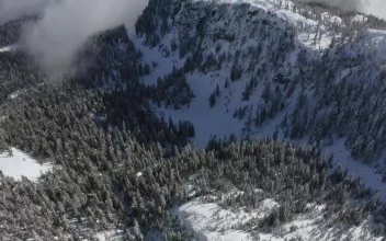 Stock Video Landscape Of Snowy Mountains Covered By Mist Animated Wallpaper